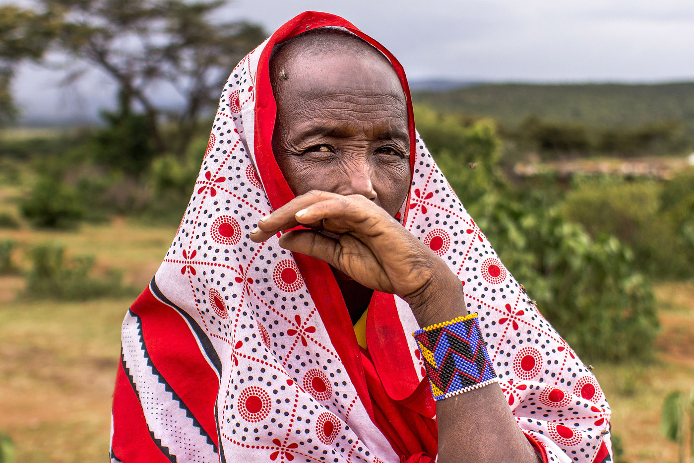 Portrait of an Old Masai Tribe Woman in traditional clothes